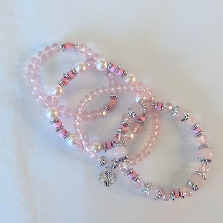 Bracelets Set Of 4 Pink And Silver Tone Beaded Stretchy Bracelets Approximate Size 3 Inches Cute Cheap Bracelets, Pink Bracelet Set, Bracelet Making Inspiration, Light Pink Bracelet, Beaded Bracelets Set, Handmade Bracelets Aesthetic, Pony Bead Bracelets Patterns, Marie Disneybound, Bracelets Coquette