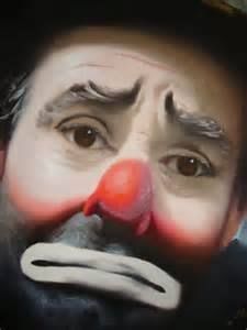 a painting of a clown's face is shown