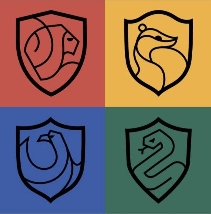 four different colored shields with two snakes on one side and the other is black