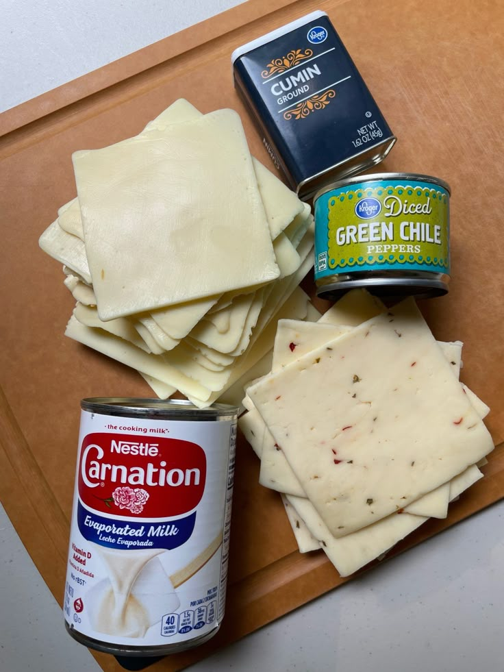 some food is sitting on top of a cutting board