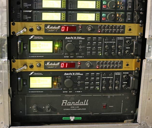 there are many electronic equipment in the back of this case, including two radio sets