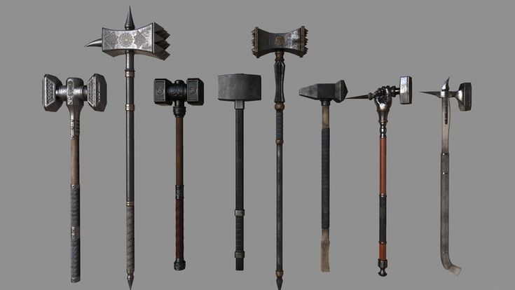 an assortment of axes and hammers from the late 19th century to early 20th century