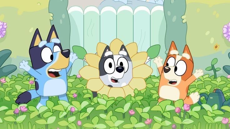 three cartoon characters standing in the middle of a garden with flowers and plants around them