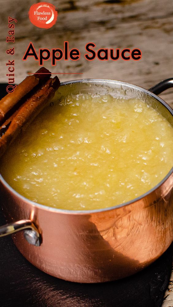 an apple sauce in a copper pot with cinnamon sticks on the side and text overlay