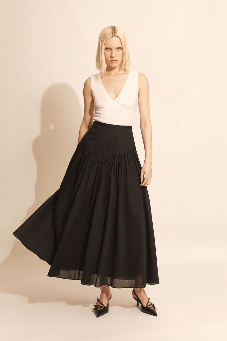 The Amorette Maxi Cotton Skirt is made from lightweight cotton for an effortless and breathable feel. It features a fitted waist, full skirt and a maxi length with soft gathered details.

SIZING: True to size AU:.Model wears a size 8 / US: Model wears a size 4.

FABRICATION: Main: 100% cotton. Lining: 100% polyester. Exclusive of trims.

- High rise
- Waistband
- Full skirt
- Fitted waist
- Maxi length Corsets Fashion, Mum Jeans, Cotton Maxi Skirts, Lace Midi Skirt, Day To Night Dresses, Textured Skirt, White Cocktail Dress, Wide Jeans, Lace Midi