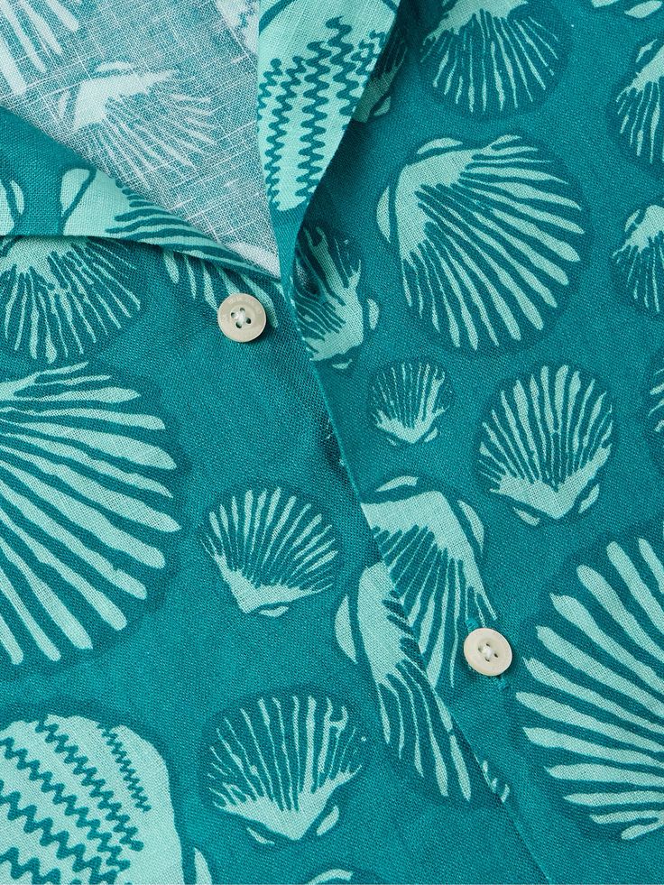 Frescobol Carioca's 'Roberto' shirt is perfect for laid-back days or more festive occasions. It's cut from breezy linen in a seashell print inspired by the label's Brazilian home. The short-sleeve camp-collar profile makes it a great choice for balmy weather and holidays. Tropical Printed Cotton Camp Shirt, Brazilian Home, Blue Tropical Cotton Camp Shirt, Collared Beach Camp Shirt With All-over Print, Nike Summer Shoes, Blue Collared Camp Shirt With All-over Print, Tropical Print Button-up Camp Shirt, Seashell Print, Tom Ford Bag