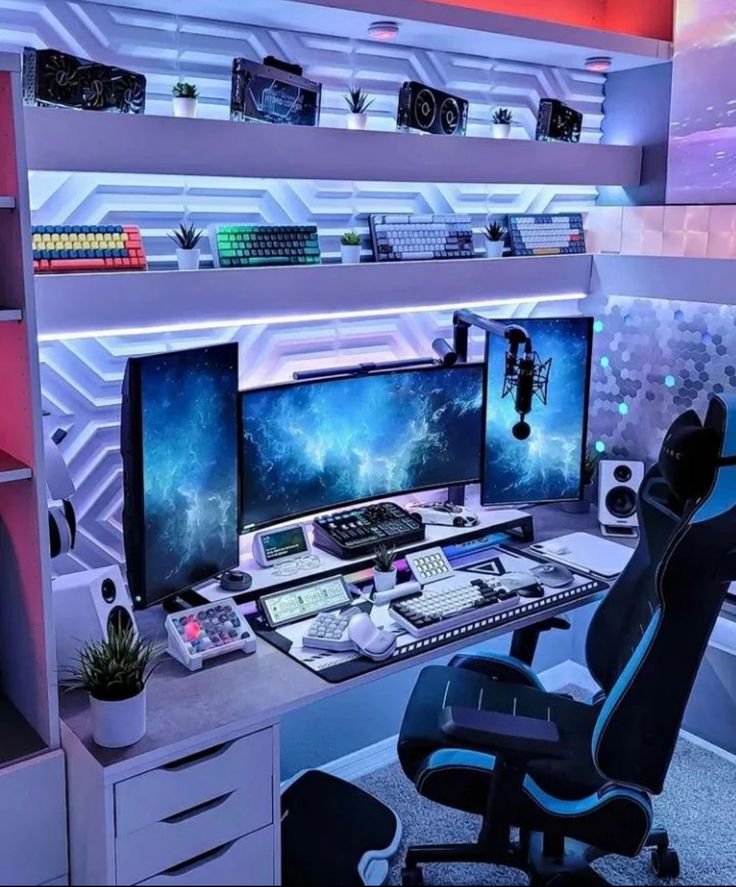 there is a desk with two computer monitors and a chair in front of the monitor