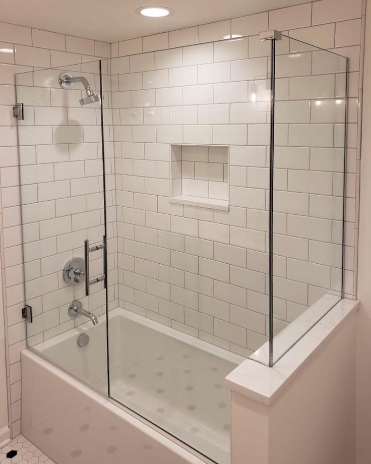 Frameless corner shower enclosure Bathtub Shower Ideas, Glass Tub Enclosure, Mid Century Condo, Half Bath Renovation, Frameless Glass Shower Enclosure, Shower Makeover, Girls Bathroom Ideas, Bathroom With Bath, Girl Bathrooms