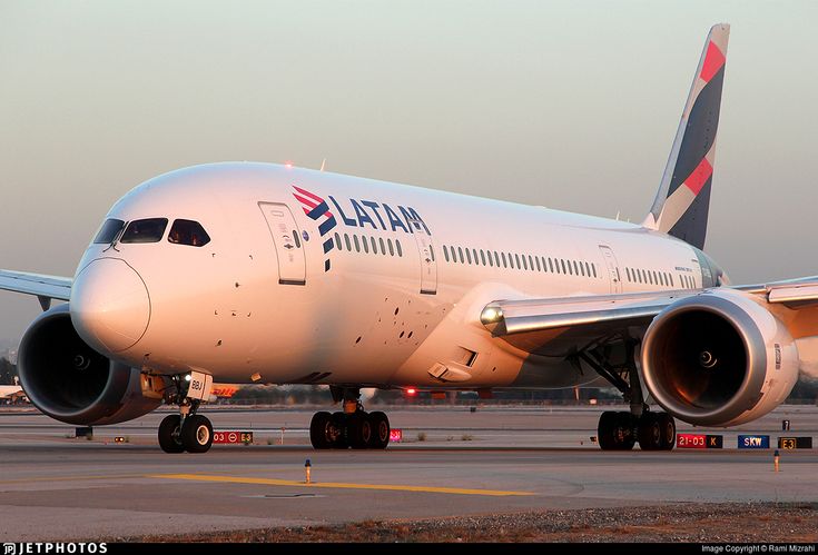 a large jetliner sitting on top of an airport tarmac