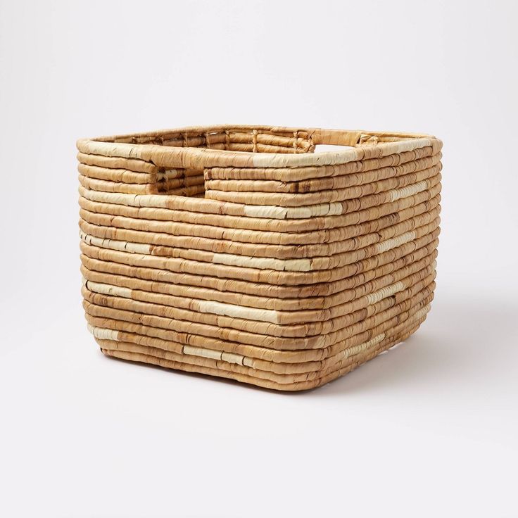 a large rectangular basket made out of bamboo