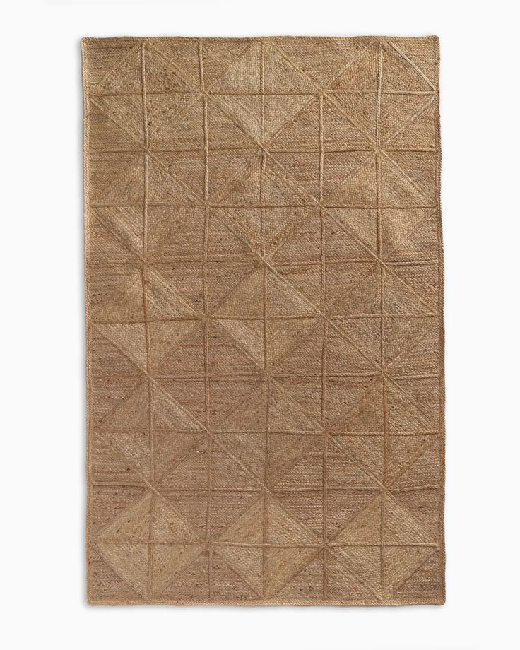 a brown rug with squares and lines on it