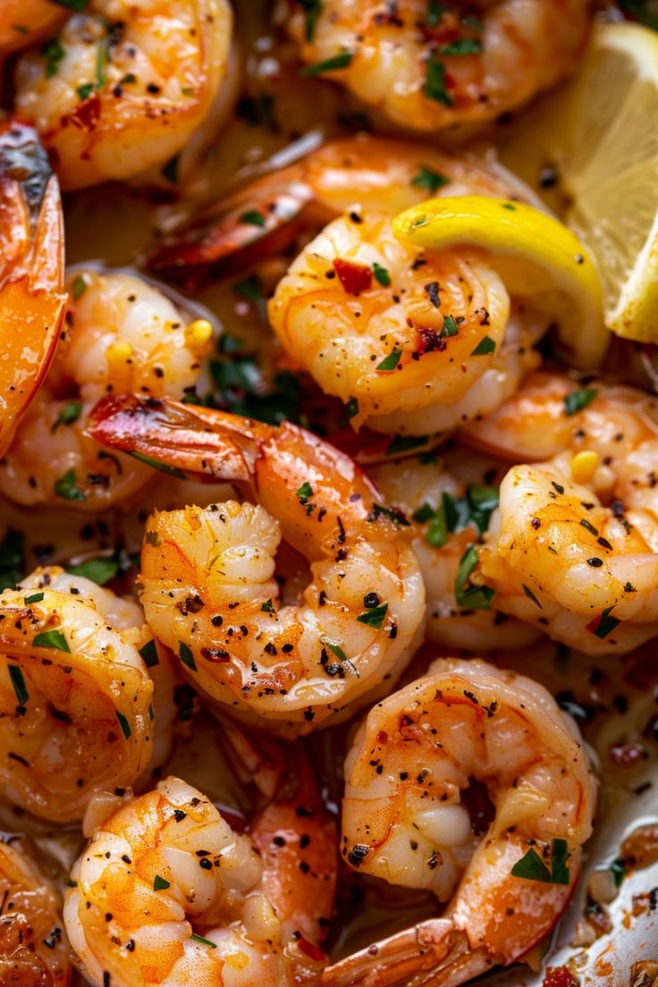 Grilled shrimp garnished with herbs and lemon wedges. Easy Garlic Butter Shrimp, Garlic Butter Shrimp Scampi, Easy Garlic Butter, Best Fish Recipes, Shrimp Scampi Recipe, Grilled Shrimp Recipes, Shrimp Appetizers, Scampi Recipe, Homemade Soup Recipe