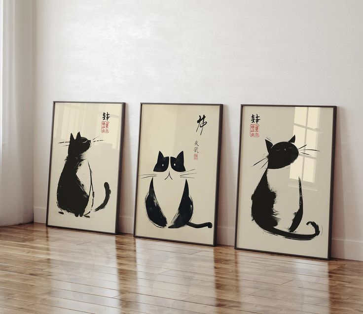 three black and white pictures with cats on them sitting in front of a wooden floor