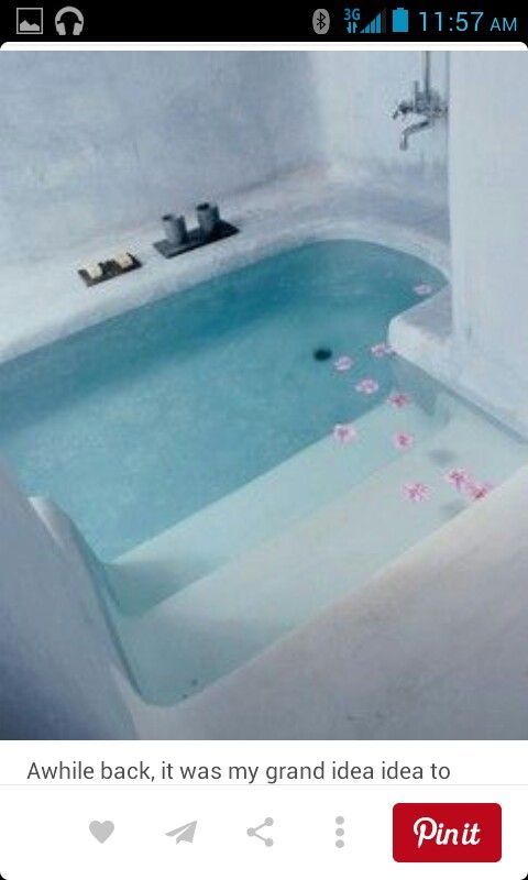 a bathroom with a large jacuzzi tub in it