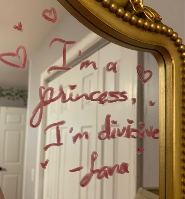 a mirror that has writing on it