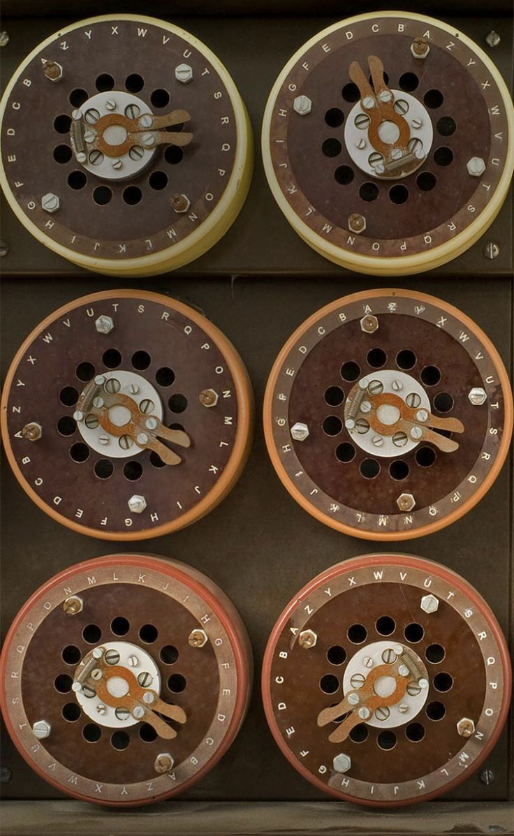 four clocks with different designs and numbers on them