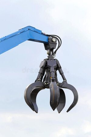 a blue crane is lifting something in the air with it's front end extended