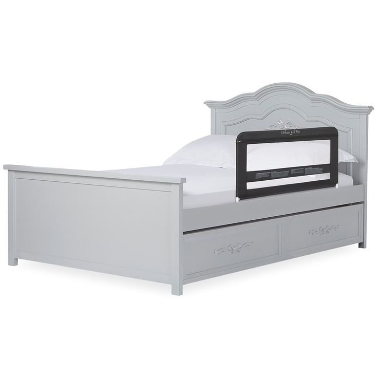 a white bed with drawers underneath it and a black frame on the headboard, in front of a white background