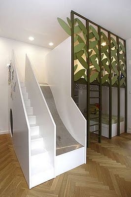 the stairs are made from white plywood and have green leaves on them as well