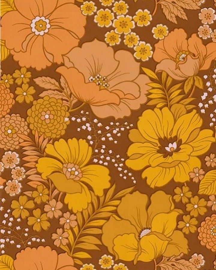 an orange and yellow flowered wallpaper with many different flowers on the side of it