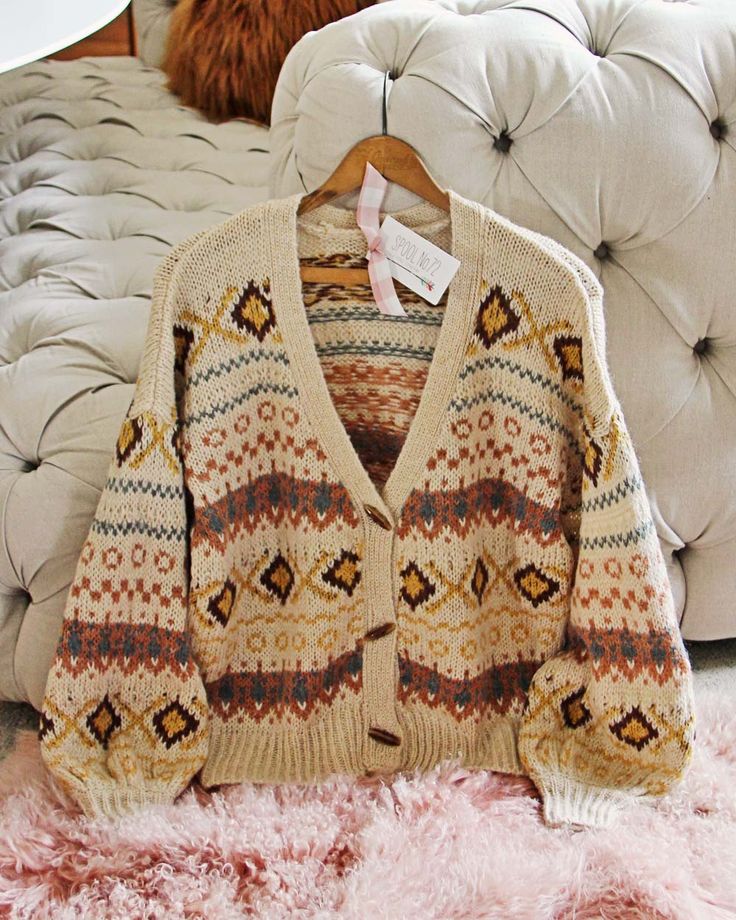 The softest thick & cozy knit pairs with Nordic & Fair Isle designs, a toggle button-up front, v-neck bust & oversized fit. Color: Sand & multi Acrylic blend Imported Hand wash cold Small Med Large Bust 44 46 48 Waist 44 46 48 Hips 44 46 48 Length 26 26 26 Bust, waist, and hip measurements are a total circumference. Length is measured from the top of the sweater to the hem. Measurements are an estimate. Cabin Sweater, Snowy Cabin, Toggle Button, Womens Sweaters, Oversized Knitted Sweaters, Oversize Knit, Color Sand, Long Sleeve Knit Sweaters, Cozy Knit