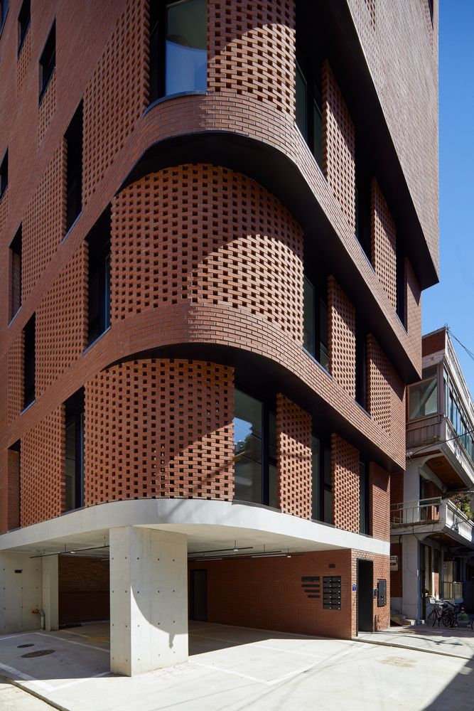 the building is made out of red bricks