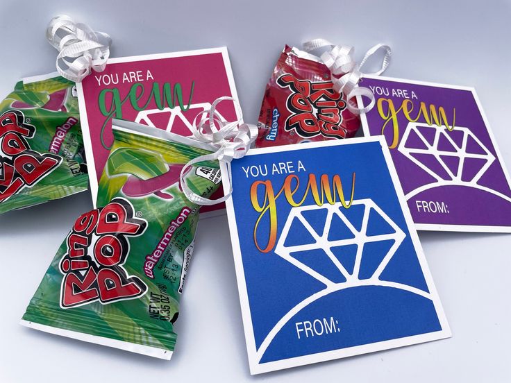 four cards with different designs on them, one has a diamond and the other says you're a gems from