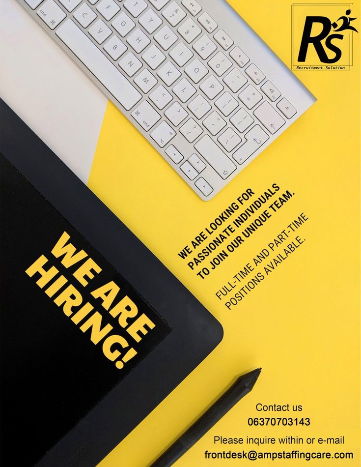 a computer keyboard sitting on top of a yellow desk