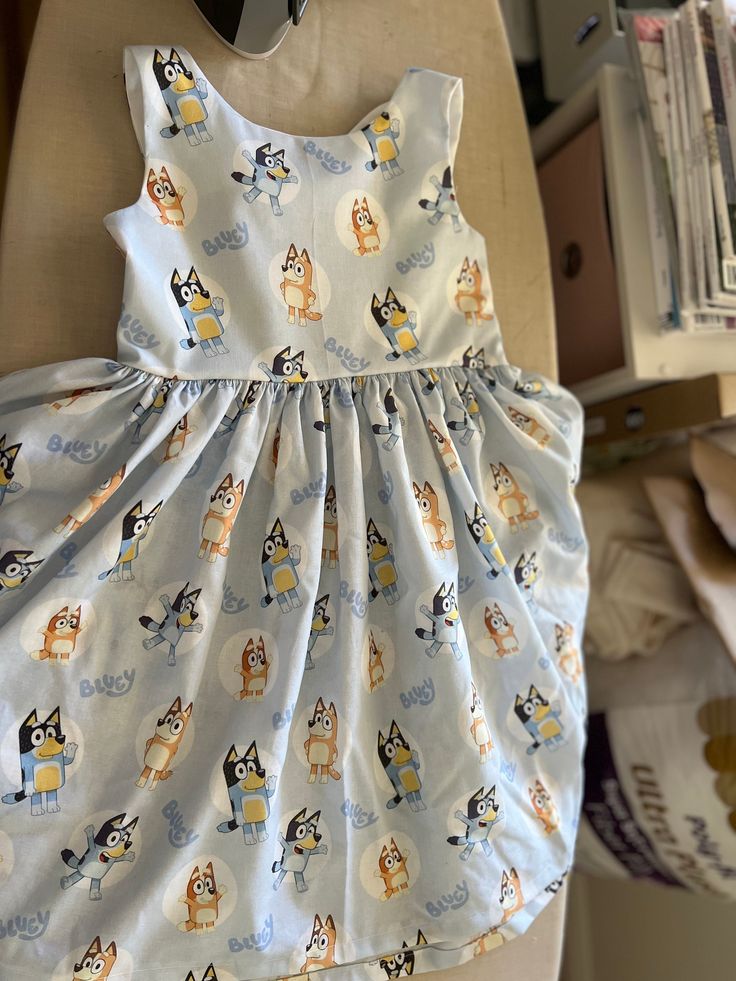 Bluey dress Cotton Cute A-line Dress For Casual Wear, Cute Fitted A-line Dress, Cute A-line Dress For Dress-up Occasions, Lined A-line Sundress, Light Blue Lined Midi Dress, Blue Lined Dress For Dress Down Occasions, Cute Midi Length Dress, Casual Blue Lined Dress, Cute A-line Fitted Dress