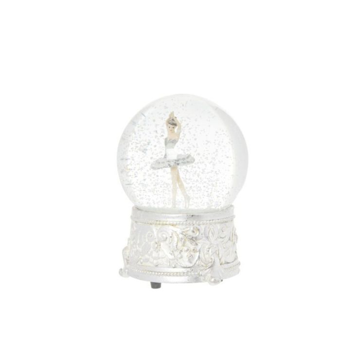 a snow globe with a ballerina figure in it