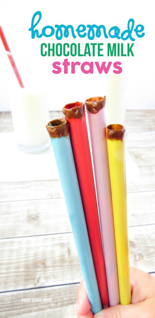 three homemade chocolate milk straws in hand