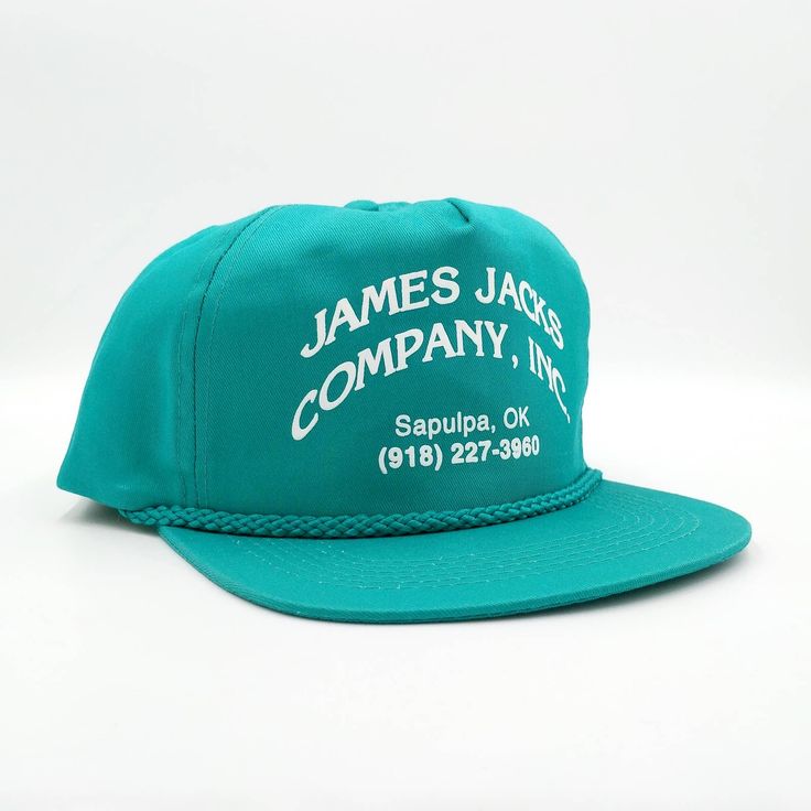 Vintage James Jacks Co Snapback Trucker Hat Color: Teal Green Size: One Size Fits All - Unworn - Vintage 90s - Snapback - Printed Logo - Adjustable - Cotton Canvas - Advertising, Industrial - Made In Bangladesh Condition: Unworn. Sku: Ac-934 Retro 5-panel Baseball Cap For Spring, Retro Spring 5-panel Baseball Cap, Vintage Green Snapback Hat With Flat Brim, Vintage Green Adjustable Snapback Hat, Green Vintage Adjustable Snapback Hat, Vintage Green Flat Brim Snapback Hat, Vintage Blue Hat With Flat Brim, Green Adjustable Vintage Snapback Hat, Green Flat Brim Vintage Snapback Hat