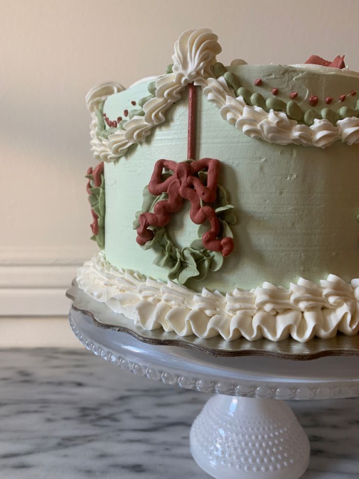 a decorated cake sitting on top of a table