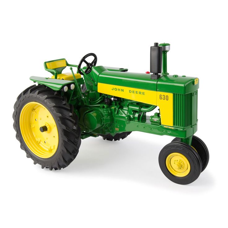 a green and yellow toy tractor on a white background