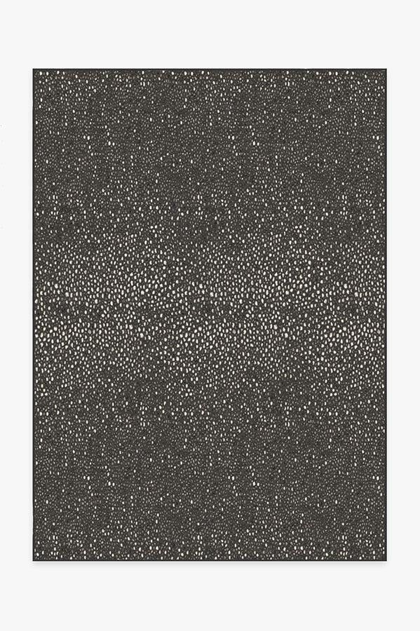 a black and white photo with small dots on it