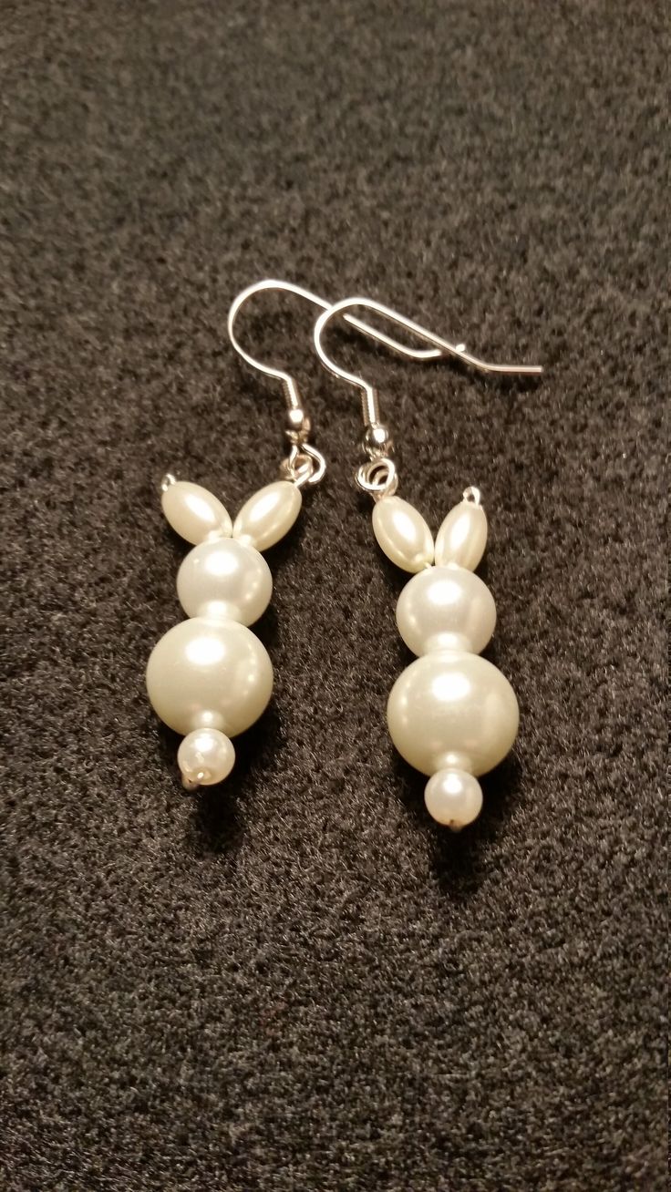 These sweet little bunny rabbit earrings are made out of glass pearl beads. They are perfect for Easter gifts for yourself and your friends or for anyone that just loves bunnies! These would make a unique addition to anyone's jewelry collection and make great gifts for friends and family! Cheap Handmade Earrings For Gifting, Cheap Cute Beaded Earrings For Gifts, Cute Cheap Beaded Earrings For Gifts, Cheap Novelty Beaded Earrings As Gift, Cheap Fun Beaded Earrings For Gifts, Cheap Novelty Beaded Earrings For Gift, Affordable Cute Beaded Earrings For Gifts, Cheap Easter Jewelry Gift, Fun Holidays