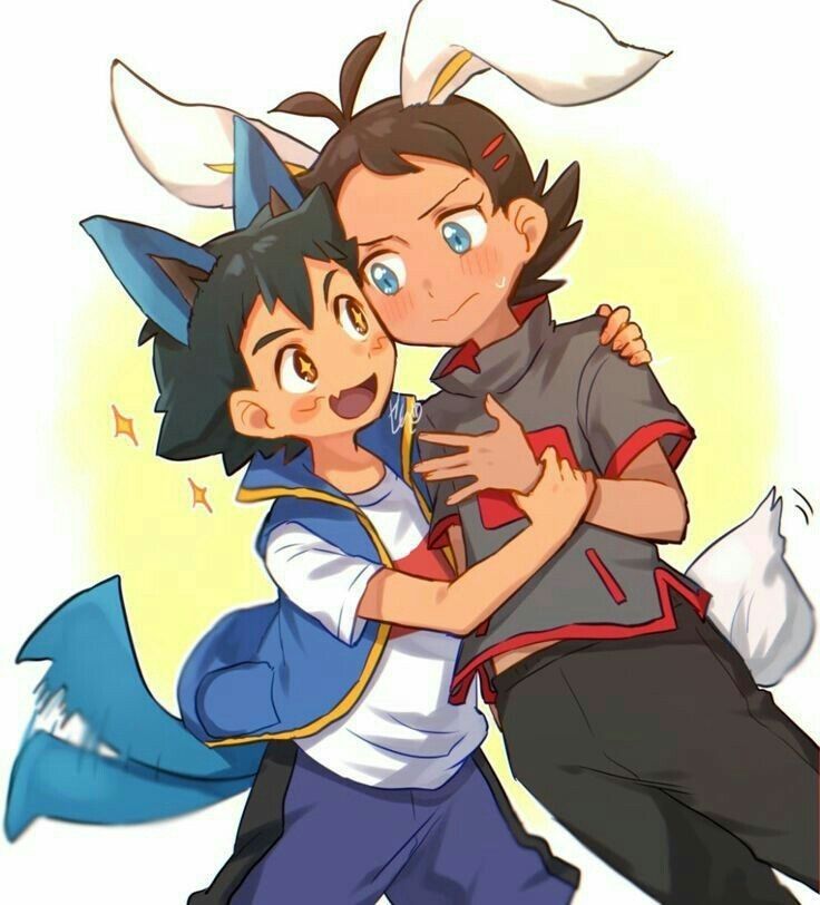 two young boys are hugging each other with horns on their heads and one boy has his face