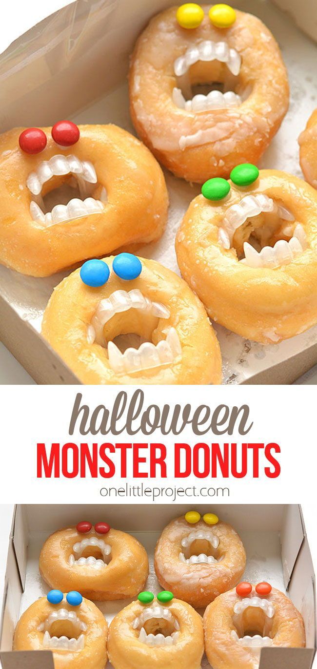 halloween monster doughnuts in a box with candy on top