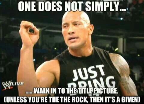 the rock is holding his fist up and saying it's going to be tough