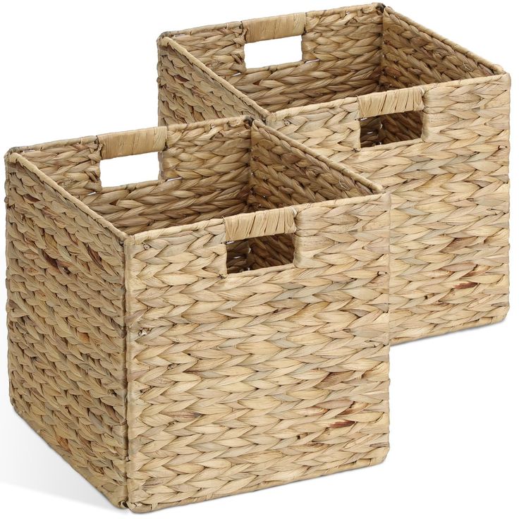 two woven baskets with handles on each side