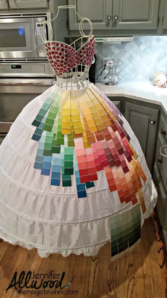 a dress made out of colored swatches in a kitchen