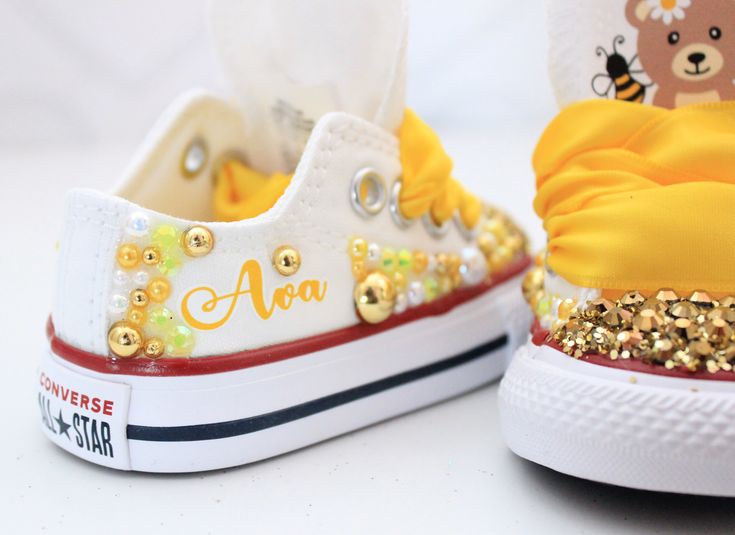 How adorable are these Bee inspired converse! The perfect shoe to complete the look! Please leave your name needed in the notebox during checkout Visit the tutu section or search bar for the matching outfit! If you are unsure of sizing please scroll to the last photos for our size charts, or visit our size charts here--> https://pinktoesnhairbows.com/pages/size-chart All sales are FINAL, Ship dates can be found directly on the listing, please view our policies in detail here---> https://pinktoes 1st Bee Day, Overalls Boys, Bee Shoes, Tutu Dress Costumes, Bling Converse, Bee Day, Girls Overalls, Girls Converse, Bee Inspired