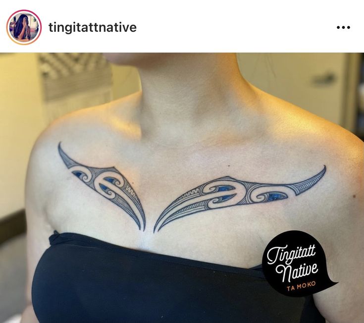 a woman with a tattoo on her chest