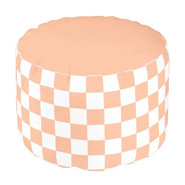 an orange and white checkerboard pattern is shown on this round poufce