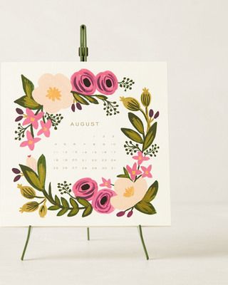 a desk calendar with flowers on it