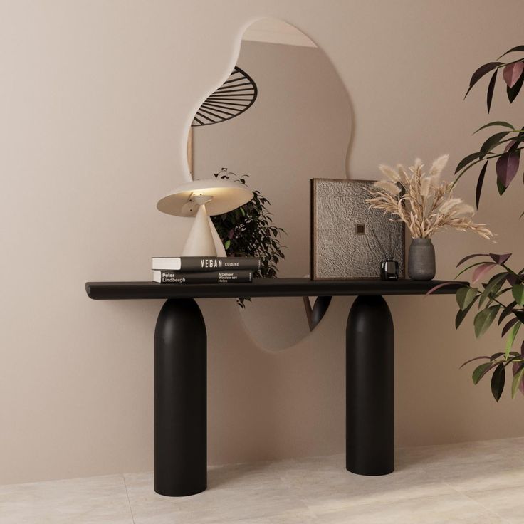 a table with some plants on it and a mirror in the corner behind it next to a potted plant