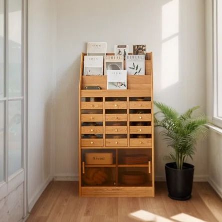 a room with a plant and many drawers