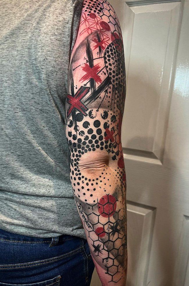 a person with a tattoo on their arm