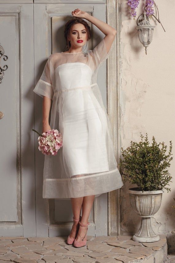 Modern wedding dress with sheer. Midi tea length sheath ♥ Elegant Wedding Dress With Overlay, White Organza Dress For Mother Of The Bride, Elegant Organza Dress For Bridal Shower, Fitted Wedding Dress With Overlay, Elegant Tulle Dress For Bridal Shower, White Tulle Dresses For Mother Of The Bride, Wedding Dress Buttons, Sheer Gown, Stil Elegant