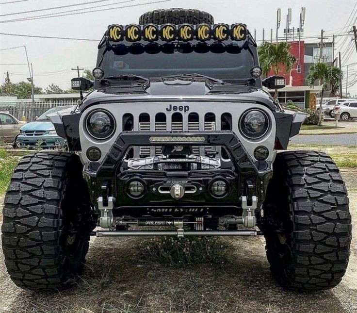 the jeep is parked on the side of the road